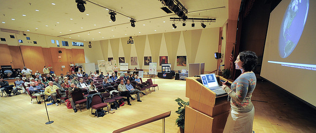 A woman giving a presentation at the NASA Goddard Space Flight Center.