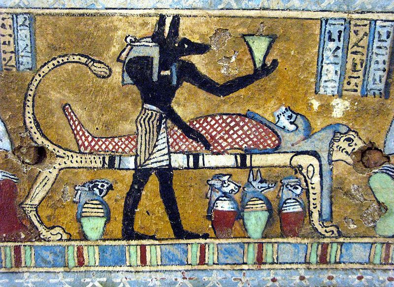 A picture of ancient Egyptian art depicting the process of removing important organs after death