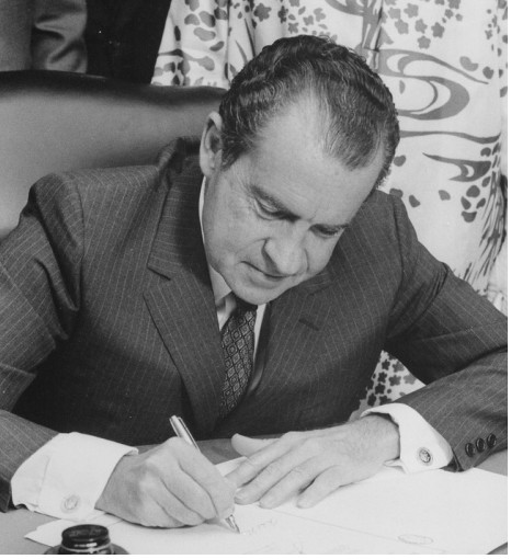President Nixon signing a bill